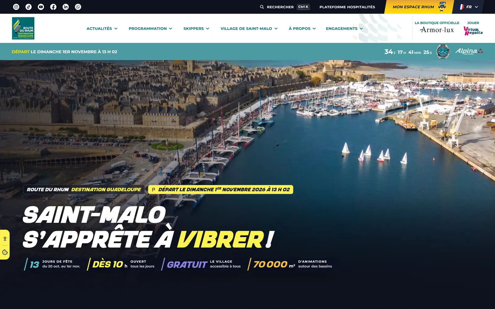 Page d’accueil du site officiel de la Route du Rhum 2026, « Saint-Malo s’apprête à vibrer » sur le port de Saint-Malo, compte à rebours du départ